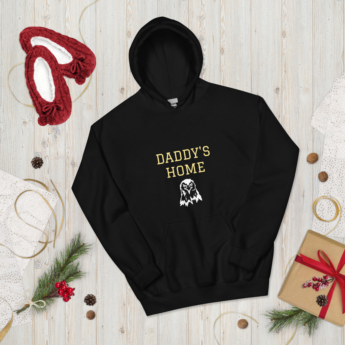 Daddy's Home Vintage Heritage Hoodie in black, holiday gift flat lay with slippers and wrapped present